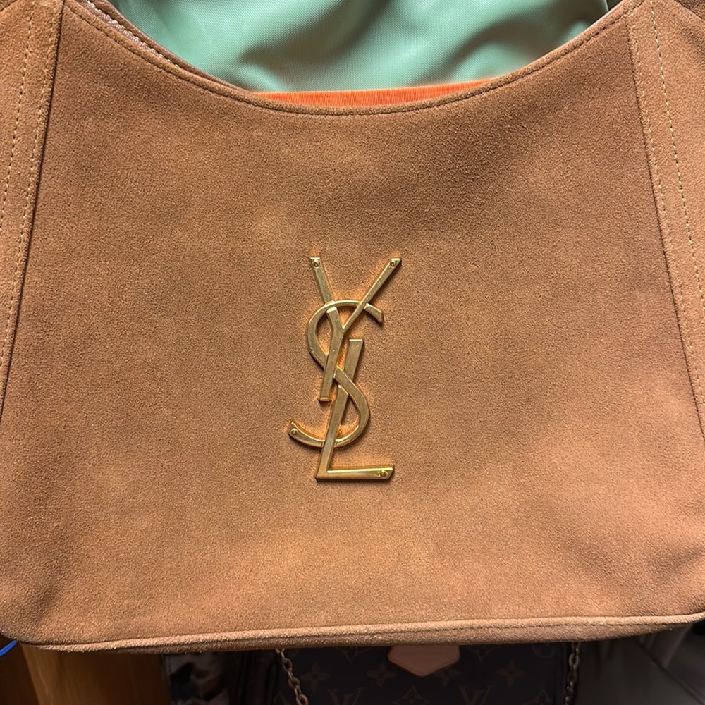 - Saint Laurent Bag/ Boutique